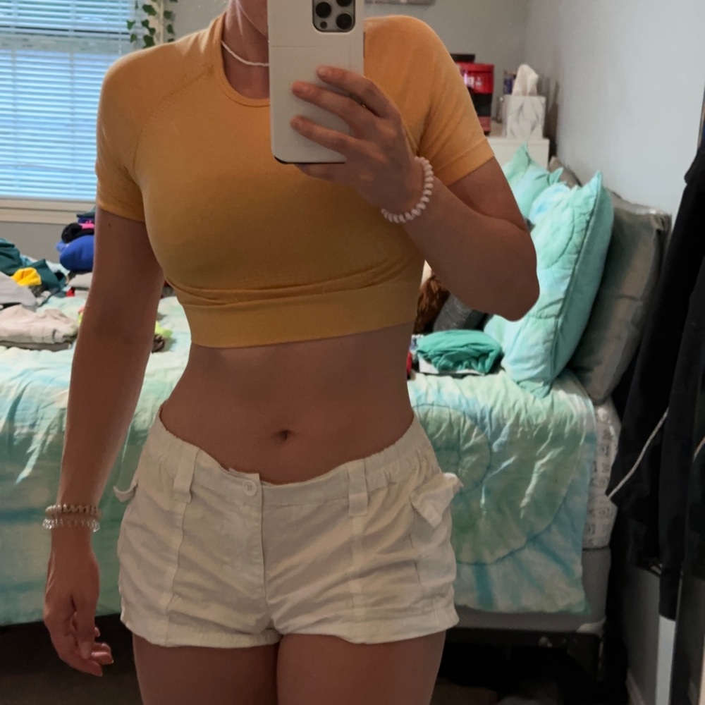 bundle of two workout shirts/crop tops, yellow size xs gray size small